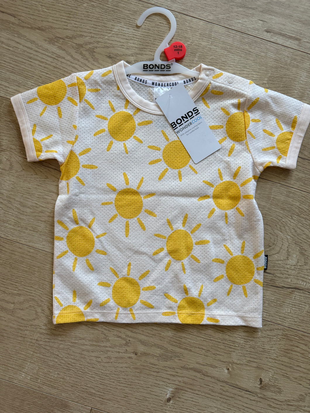 Sun-Burst Eyelet Wondercool Tee